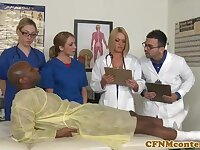 A kinky ebony patient is porking a saucy nurse who luvs to gargle rock hard sausages